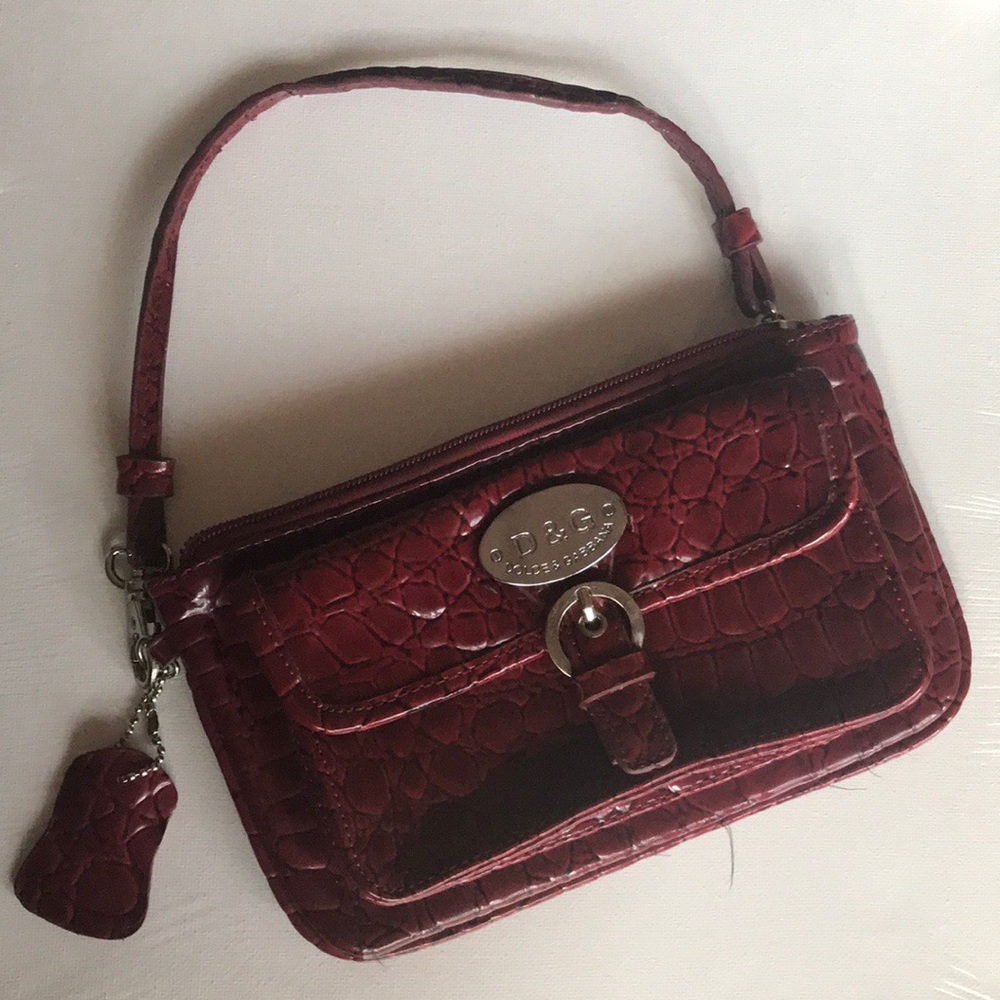 A Dolce & Gabbana wristlet.